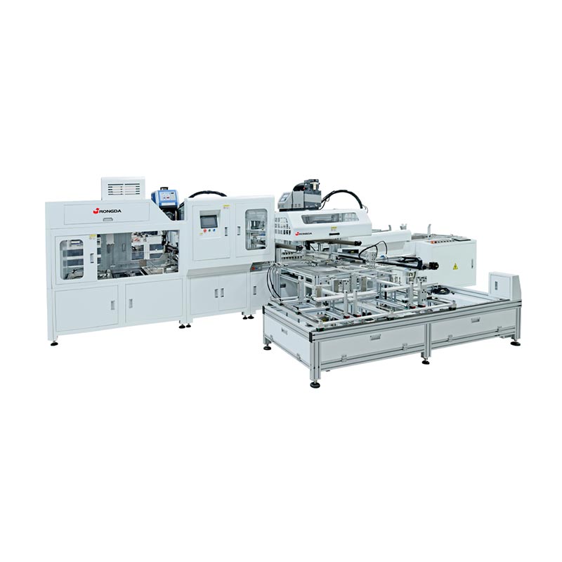 Skladací stroj na montáž krídel boxov