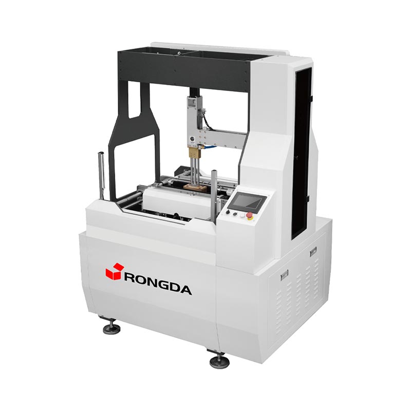 Stroj na balenie pevných krabíc